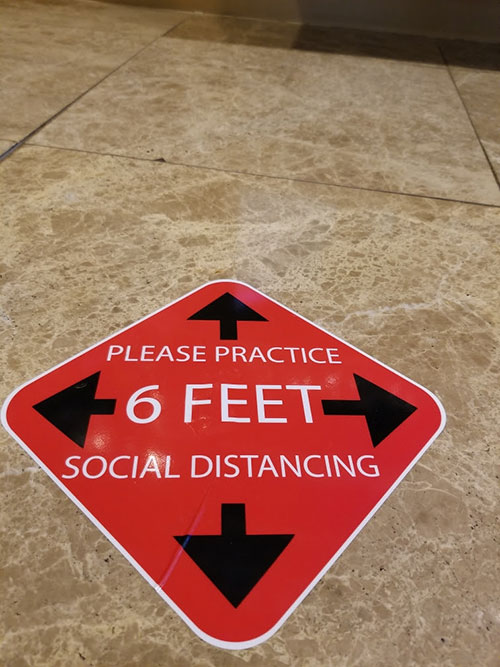 Social-Distancing-Floor-Sign