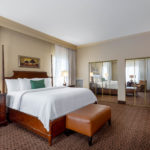 Accessible presidential suite king bed at Hawthorn Suites By Wyndham West Palm Beach
